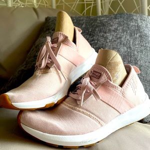 Pale pink New Balance tennis shoes